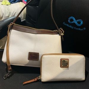 Dooney and Buorke crossbody with matching wallet.
